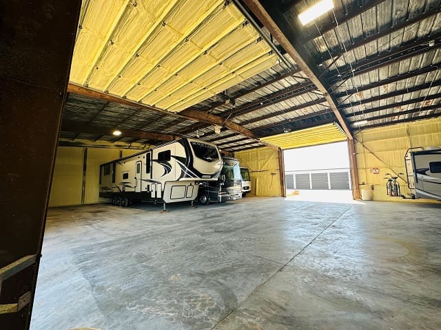 The inside of the Woodland In-N-Out Storage heated RV/boat storage building.