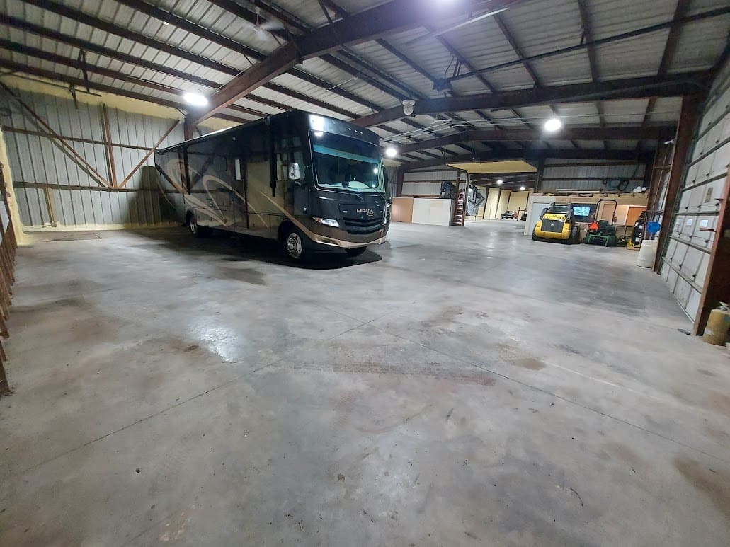 side view of enclosed trailer with logo on side promoting trailer rental service